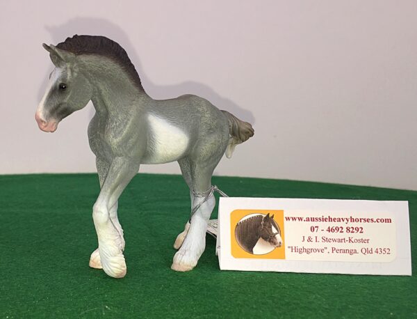 The Grey Sabino Clydesdale Foal is a quality miniature replica. Of the Collecta brand it is highly collectable.