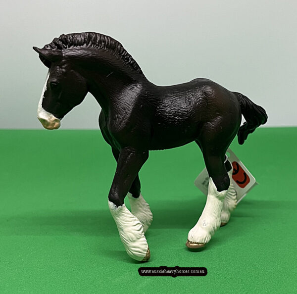 This Black Sabino Clydesdale Foal is a very lifelike figurine. An anatomically accurate sculpture replicating the Clydesdale foal in miniature.