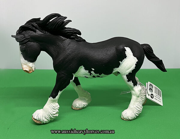 This Black Sabino Clydesdale Stallion is a very lifelike figurine. An anatomically accurate sculpture replicating the Clydesdale stallion in miniature.